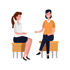 elegant businesswomen seated in benchs