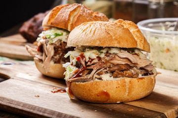 Homemade pulled pork burger with coleslaw salad