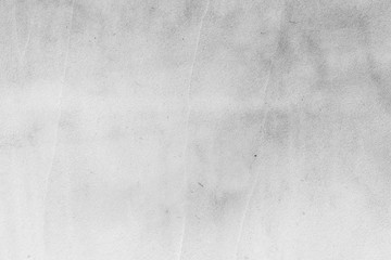 Texture of a concrete wall with cracks and scratches which can be used as a background