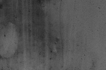 Texture of a concrete wall with cracks and scratches which can be used as a background