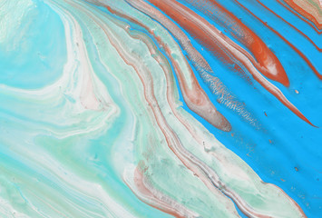 photography of abstract marbleized effect background. Blue, mint, cooper and white creative colors. Beautiful paint
