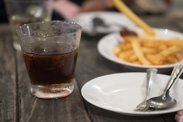 A glass of iced soft drink