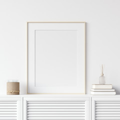 Mock up poster frame on chest of drawers near white wall, Scandinavian style, 3d render