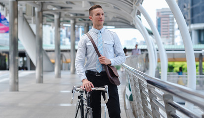 Young Business man with Bicycle  for go to Work.  Financial man business Office Company Lifestyle for working Corporate.
