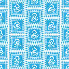 Blue geometric tiled floral seamless pattern.