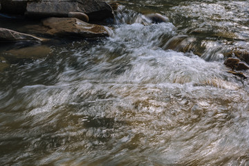water flowing over rocks