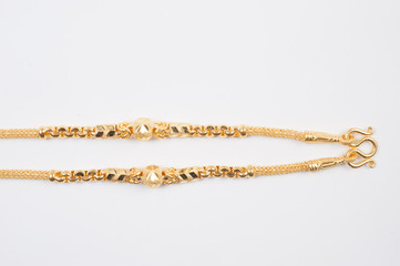 Fototapeta na wymiar Gold chain necklace isolated on white background.