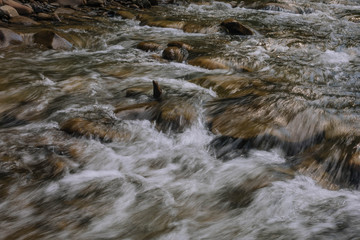 water flowing over rocks