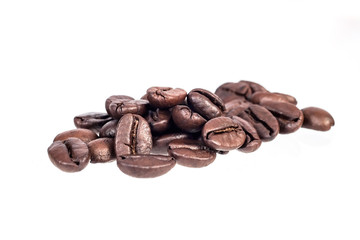 Fresh roasted beans on white background.