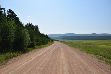 Fototapeta na wymiar Siberia.Field. Road