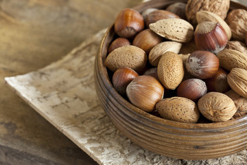 Fresh Harvested Nuts In Wooden Bowl