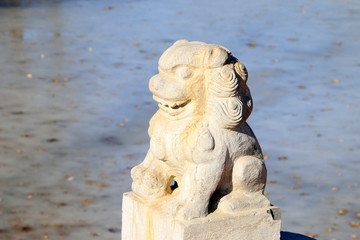 Carved stone lions in a park