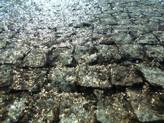 The surface of the water in the fountain