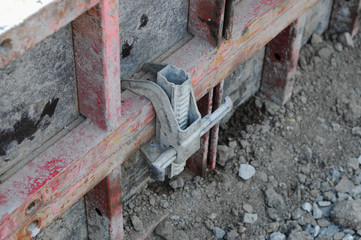 new house, building construction site, cement in foundation and reinforcement of steel bars