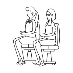 elegant businesswomen workers seated in office chairs