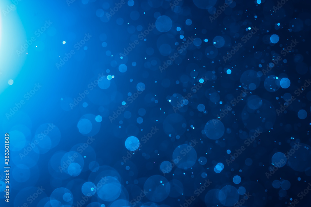 Wall mural abstract blue bokeh background