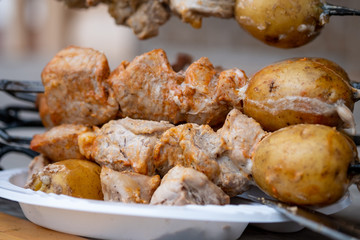 Skewers in the tandoor. Cooking kebab of meat in a tandoor.