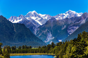  Mirror glacial Lake Matheson and Mount Cook