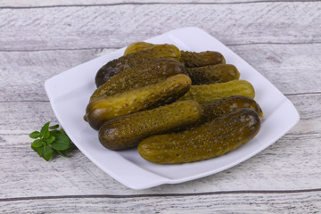 Pickled cucumbers heap in the bowl