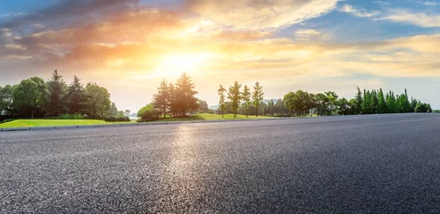 Gardinen Sommer Country road and green woods nature landscape at sunset  © ABCDstock