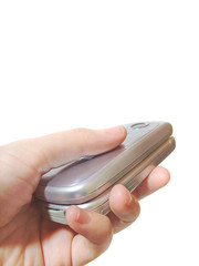 手に持った携帯電話