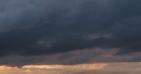 summer sunset skyscape with moving clouds