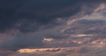 summer sunset skyscape with moving clouds