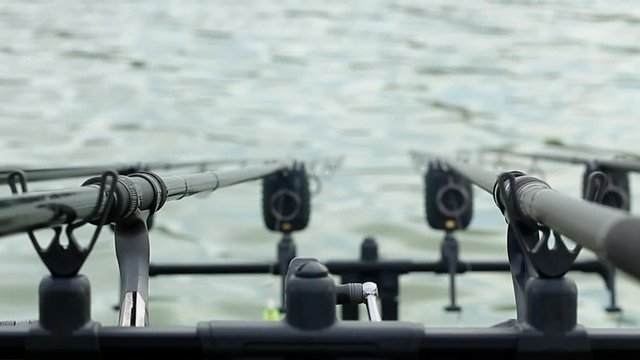 Carp fishing, rodpod on a wooden platform on a pond