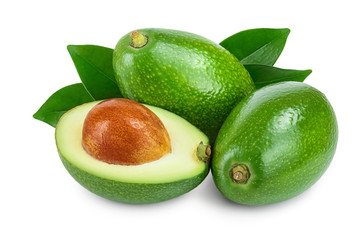 avocado and half with leaves isolated on white background close-up