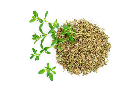 Green thyme with dried thyme leaves isolated on white background close up