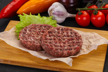 Raw burger cutlet
