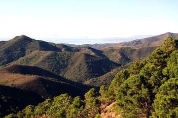 Elevated view across the mountains towards the Mediterranean sea, Puerto de Alijar, Andalusia, Spain.