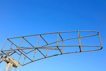 Steel frame under blue sky