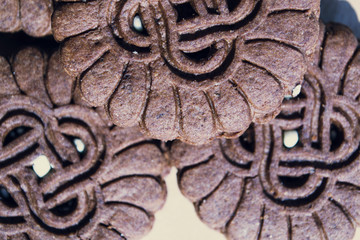 A brown  sandwich-cookies with cream. Close-up photo. Top view.