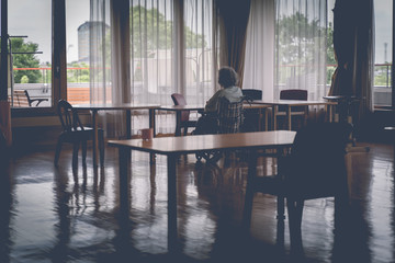 A lonely old woman in a big house without care