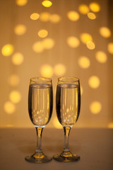 Glasses on a background of illumination