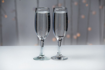 Glasses on a background of illumination