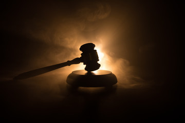 Document with judge on wooden table. Law theme. Selective focus