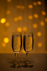 Glasses on a background of illumination