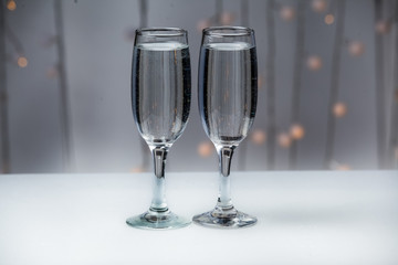 Glasses on a background of illumination