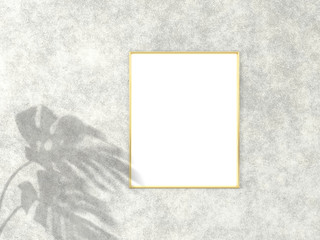 4x5 vertical Gold frame for photo or picture mockup on concrete background with shadow of monstera leaves. 3D rendering.