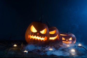 Halloween pumpkin lantern in mist
