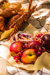 Fresh croissant at a picnic in the sun