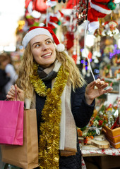 Cheerful girl at Christmas fair