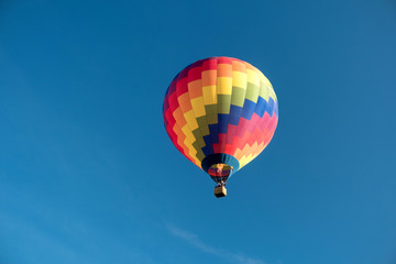 Detail of a starting colorful hot air balloon