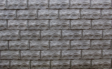 Masonry facade. Brick. Paving slabs. Background. Texture..