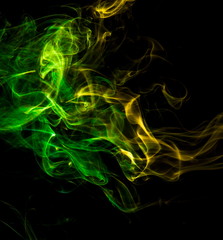 Colored smoke on black background