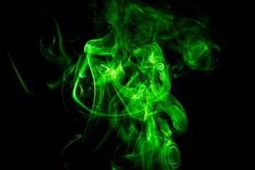 Green smoke on black background