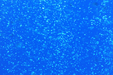 Background of air bubbles in blue water