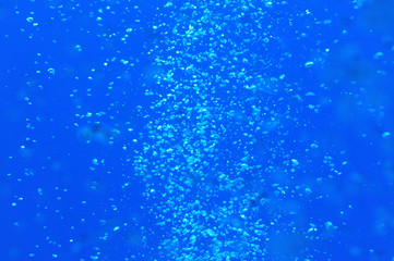 Background of air bubbles in blue water